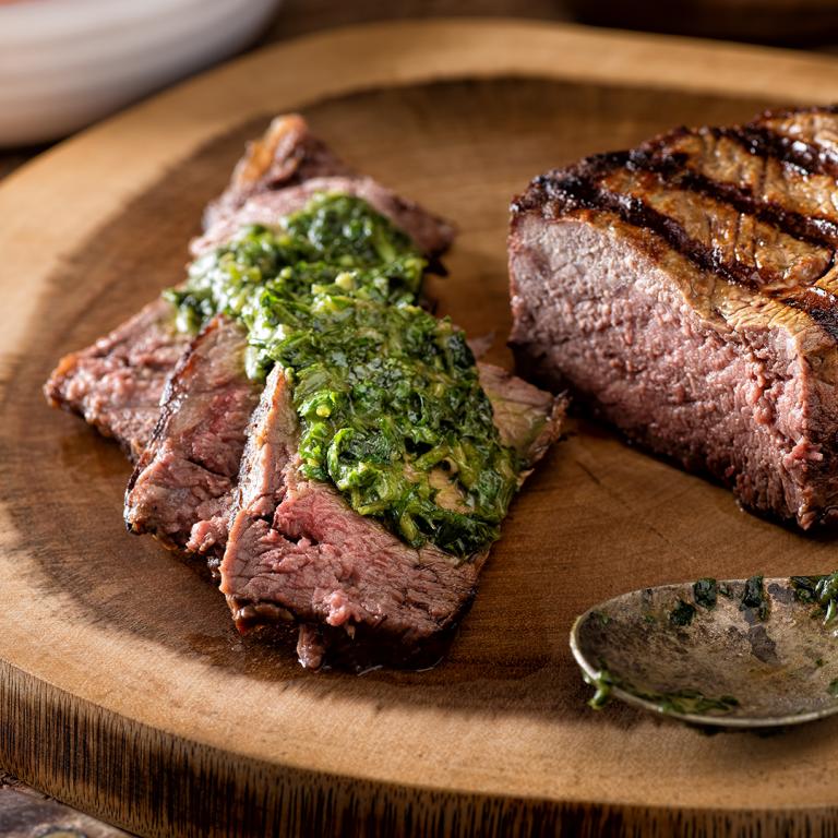 chimichurri sauce on meat